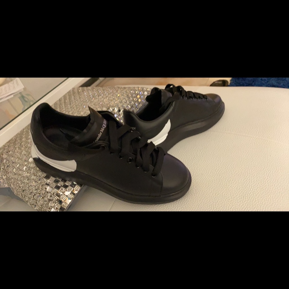 Alexander McQueen sneakers Black with White on the Heal.